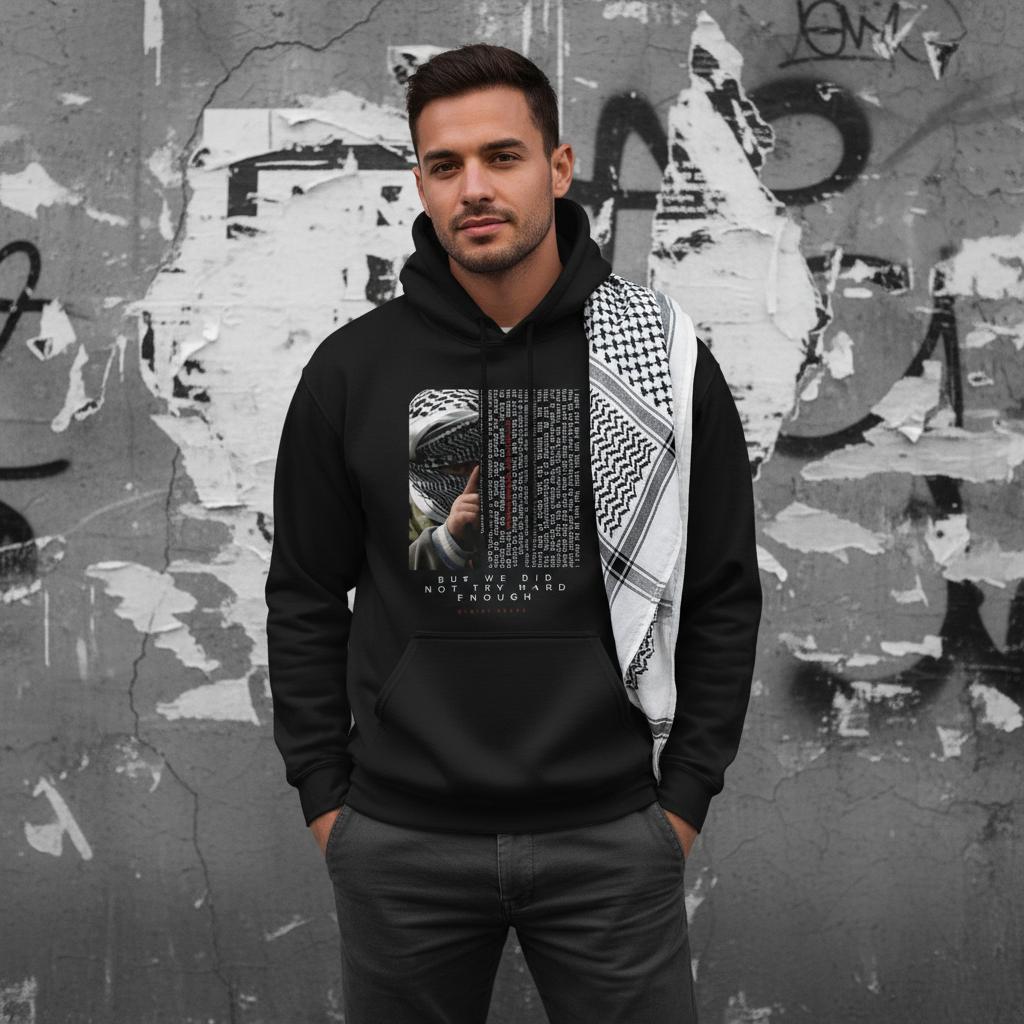 Chris Hedges- But We did not Try Hard Enought. handsome arab man wearing kuffiyeh on shoulders with hands in pockets. image for upper half only. background old cracked wall with some torn plain posters and torn out duct-tape. black and white image. only model in full color with glowing light on model