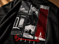 A close-up of a black t-shirt featuring a detailed graphic print of the Gaza cityscape in a triptych style, with red and black tones and coordinates printed on the right panel.