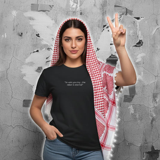 In vain you try: the rebel is eternal | beautiful arab woman wearing kuffiyeh on shoulders with one hand in pockets the other raising victory sign. image for upper half only. background old cracked wall with some torn plain posters and torn out duct-tape. lack and white image. only model in full color with glowing light on model