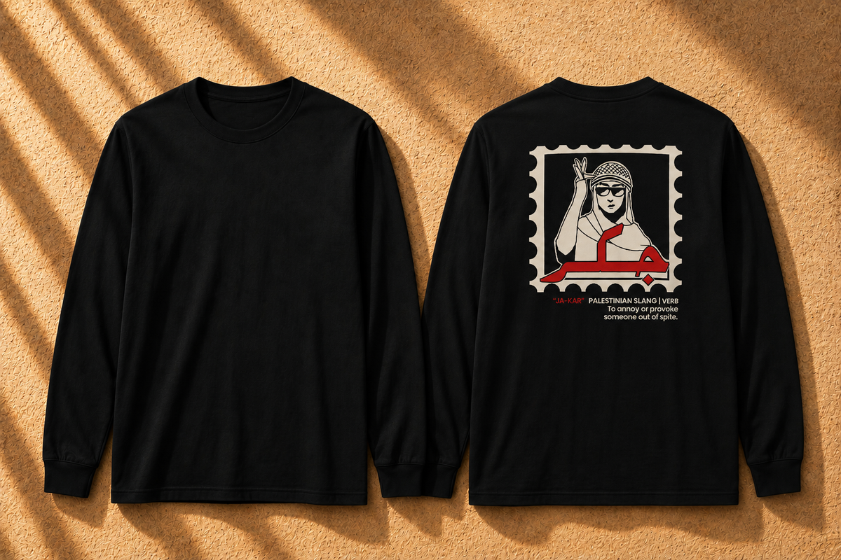 Two black long-sleeve t-shirts shown flat against a textured tan background with diagonal shadows. The left shirt is plain, and the right shirt features a large back graphic styled like a postage stamp with a black-and-white illustrated figure and red text.