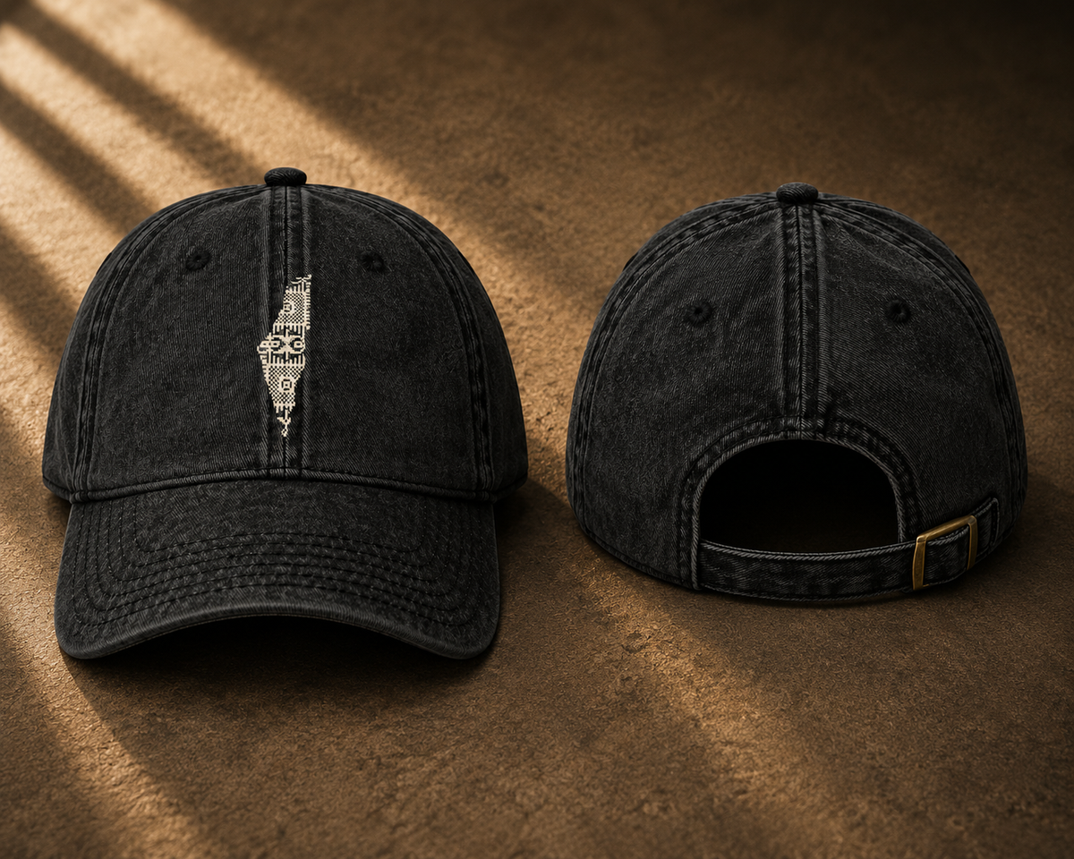 Two views of a washed black baseball cap on a textured brown surface with dramatic diagonal shadows. The front view shows a white graphic of a lightning-bolt-shaped ice cream cone, and the back view shows the adjustable strap with a gold-tone buckle.